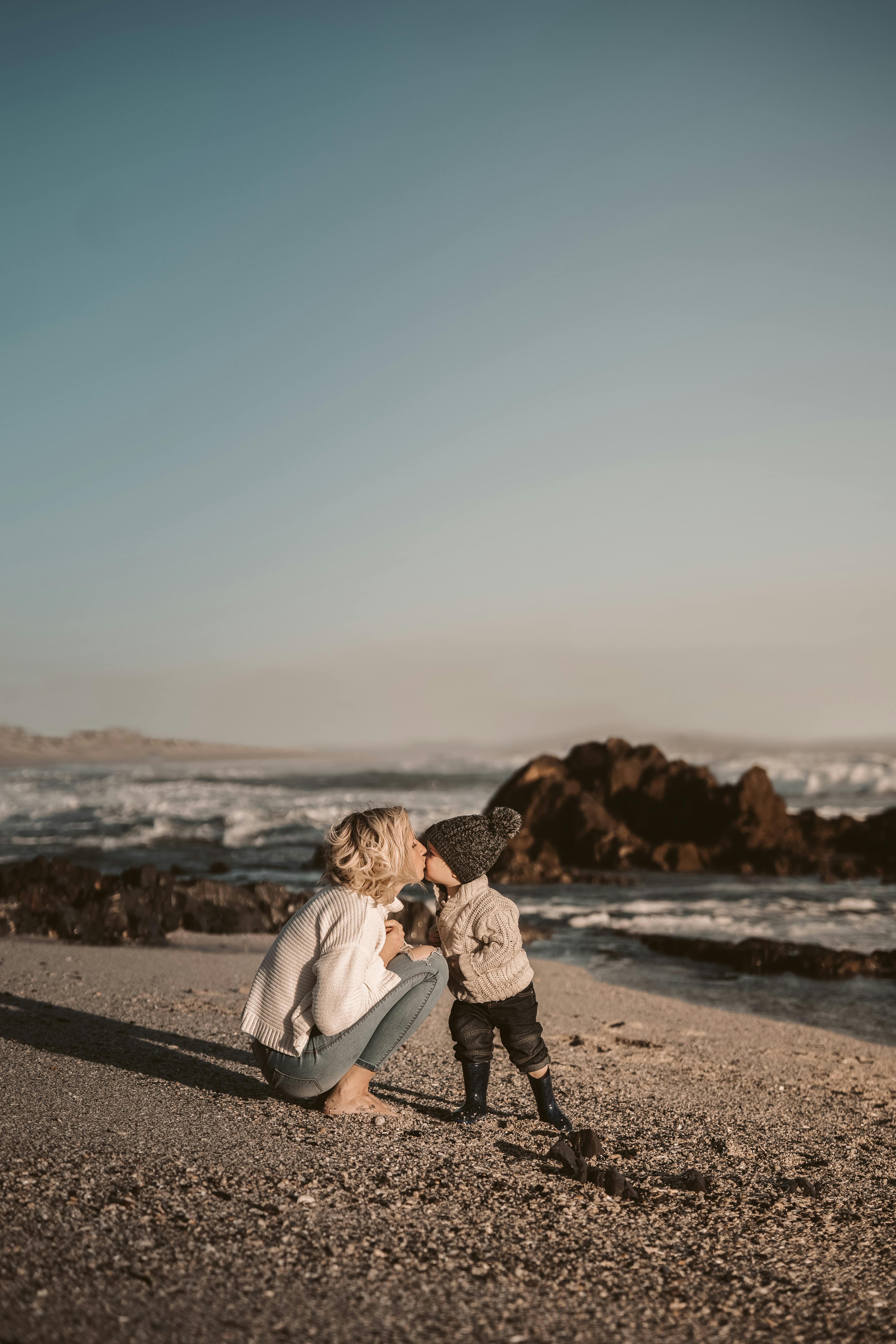 mom and son on beach