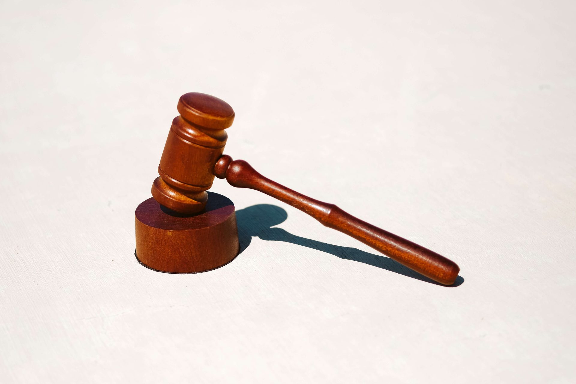 Wooden gavel on a light background
